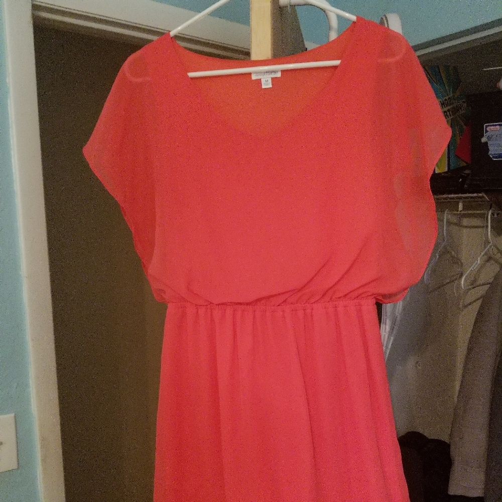 Medium, pink, blue stitching dress.